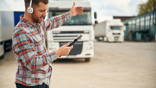 Transport Man With Tablet Outside 2025 03 18